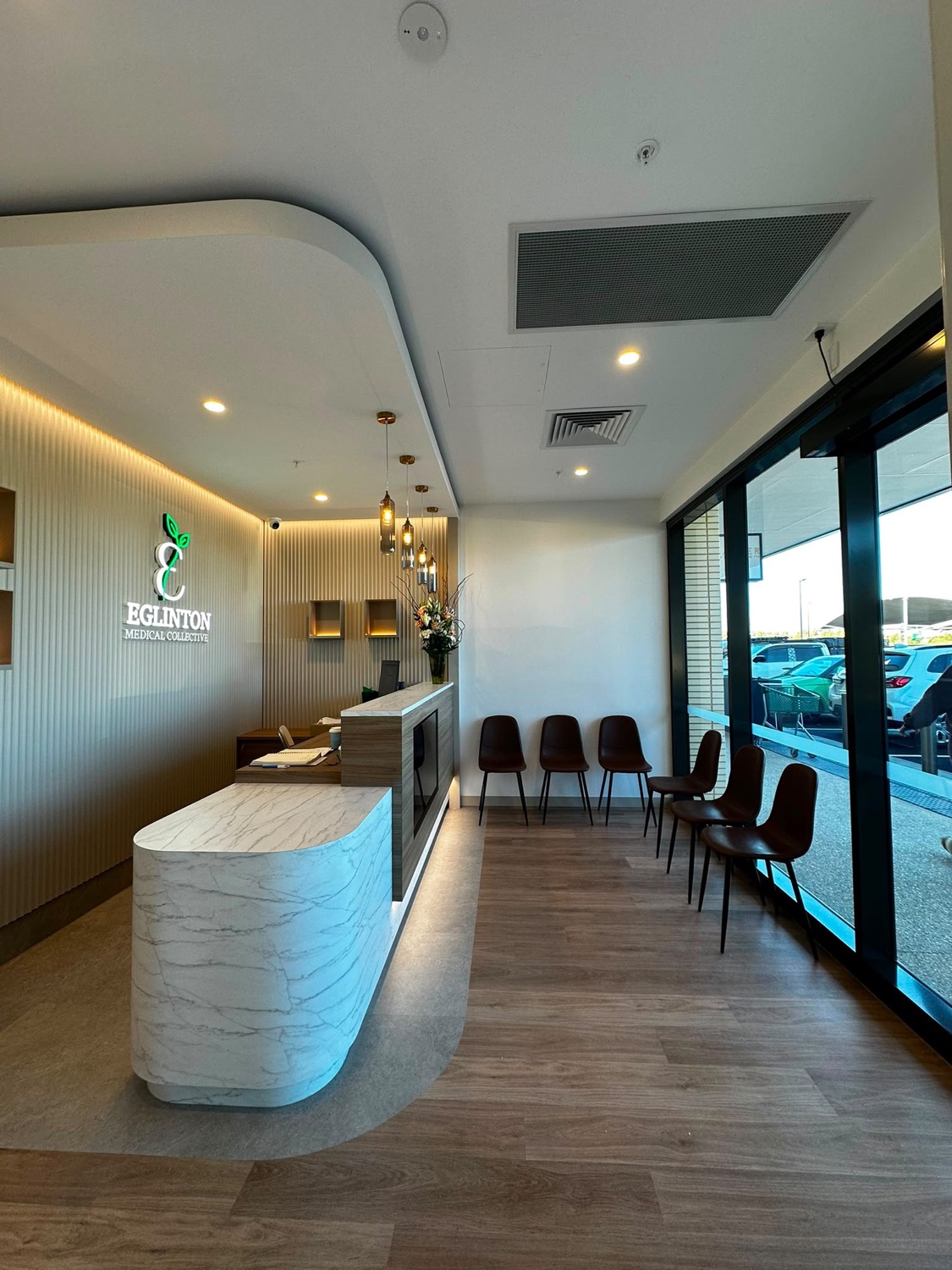 The waiting area at Eglinton Medical Collective, with natural light and calm tones